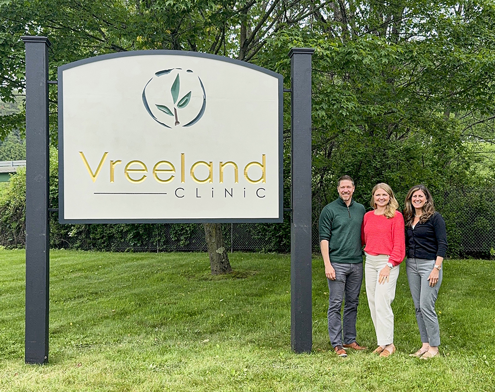 new sign small Vreeland Clinic’s new office sign with staff